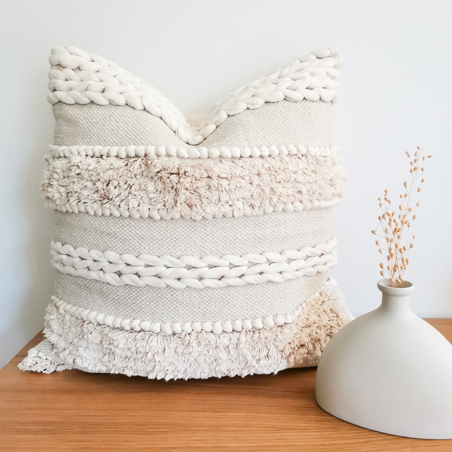 White boho cushion with frills and handloom weave