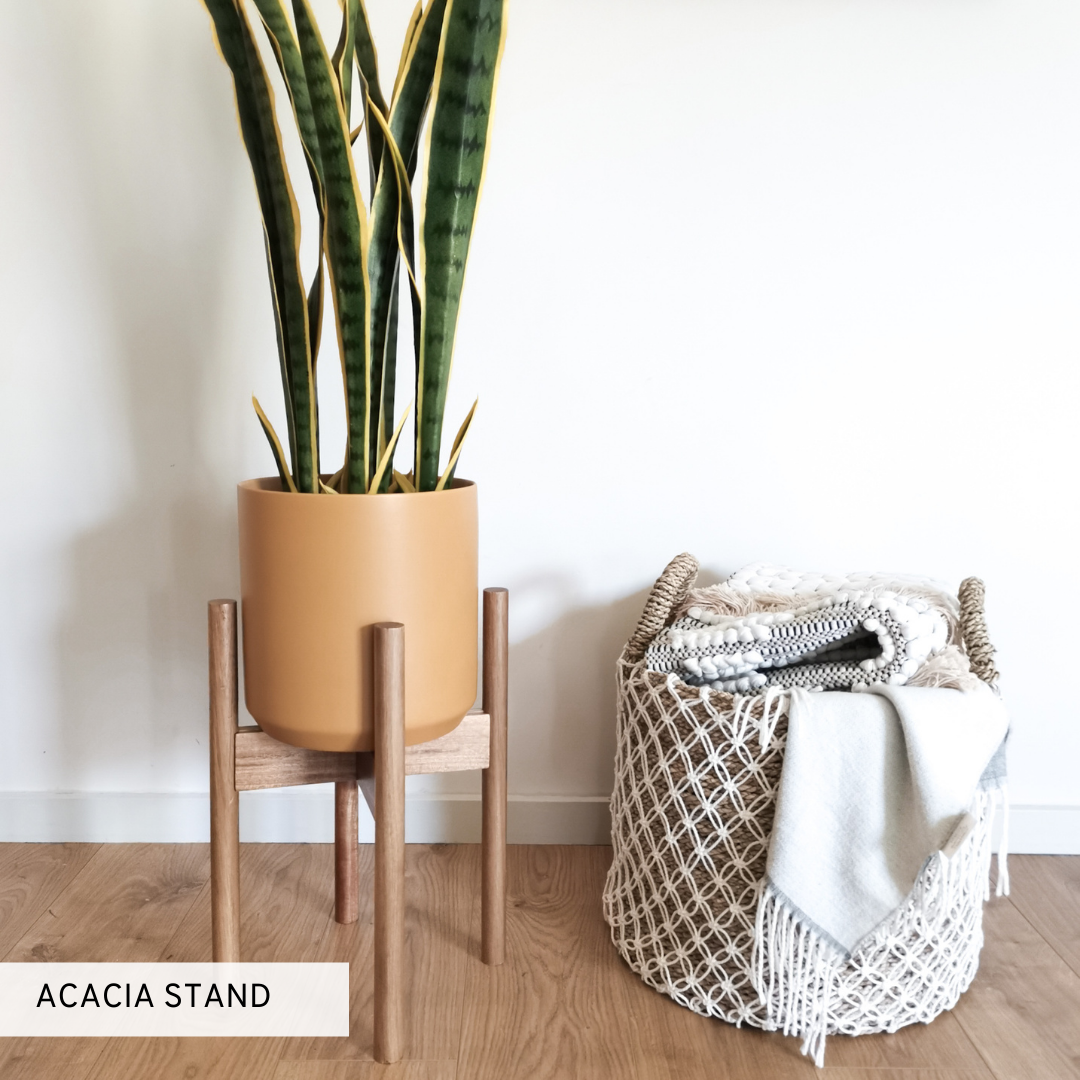 Wooden plant stand with light wood tone made from natural bamboo and acacia