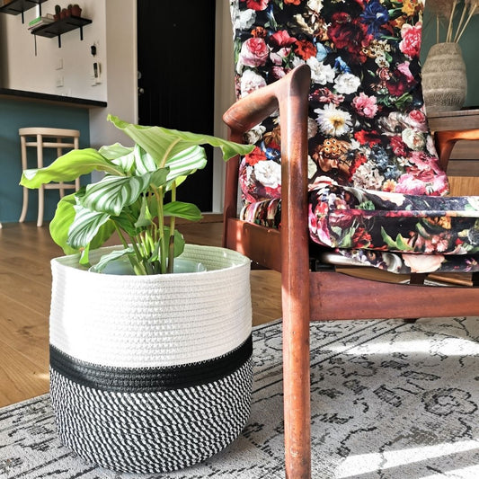 Made from 100% pure cotton rope, this eco-friendly basket features neutral tones like black, white, and beige. In addition, the woven pattern gives your space a unique natural texture.
