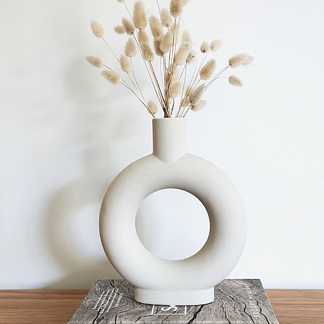 Ceramic White base, donut shaped, perfect for dried flowers or pampass grass. 